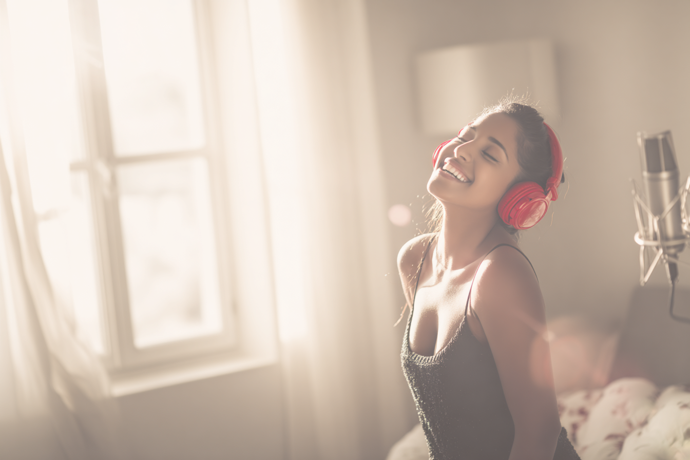 Musician using vocal splitter to practice.