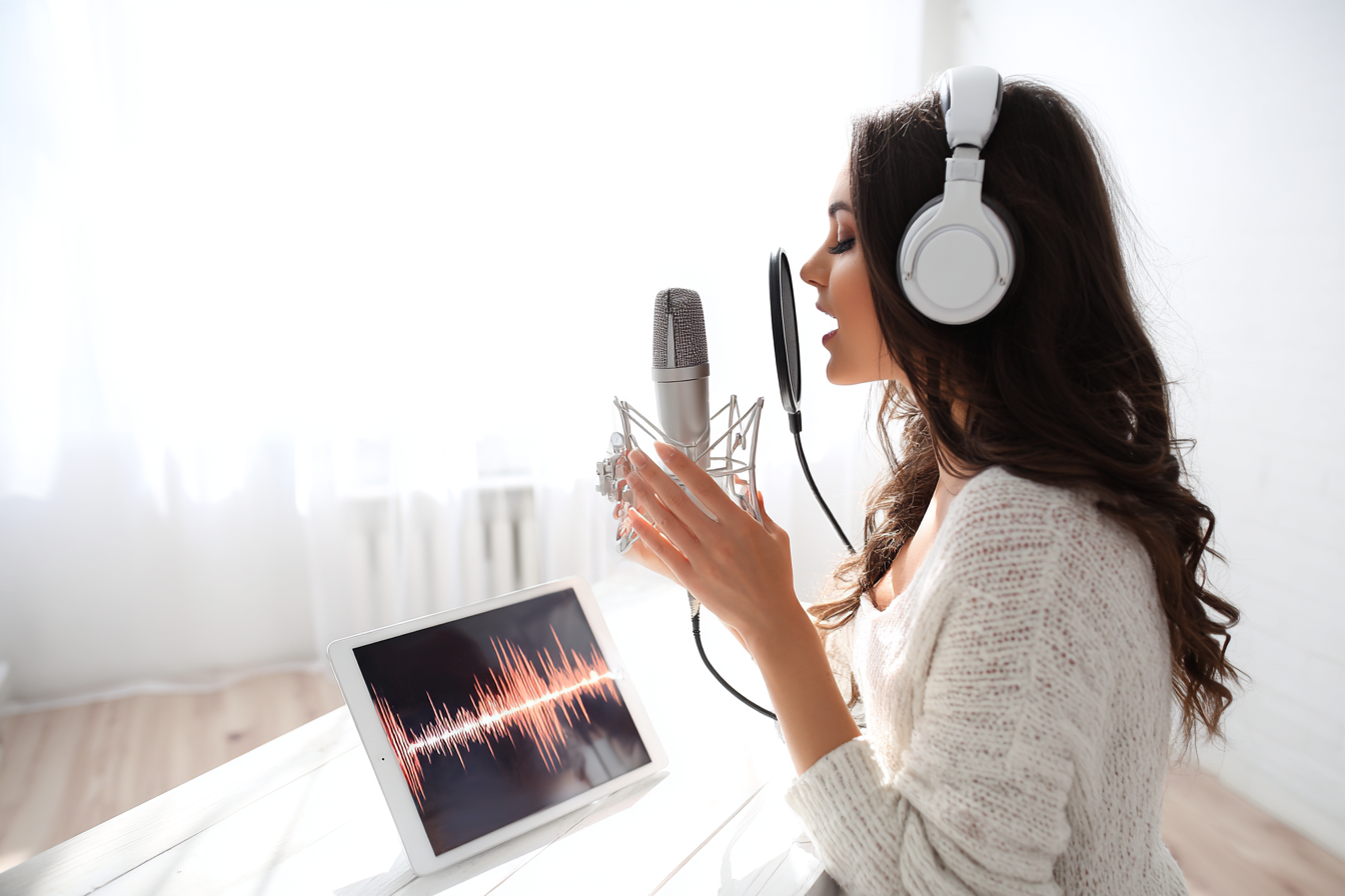 Musician practicing with instrumental remover backing track.